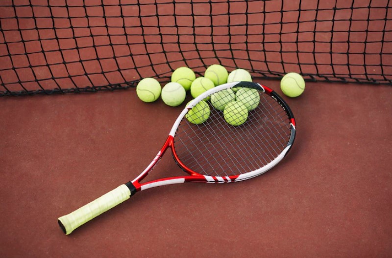 Tennis with ball and rackets