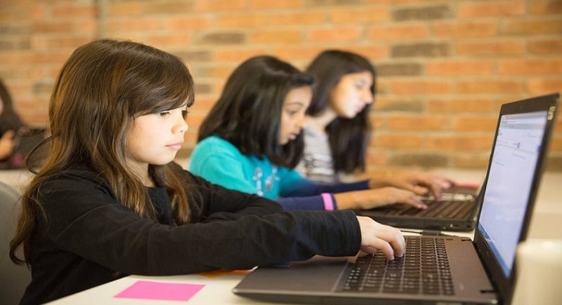 girls using laptop