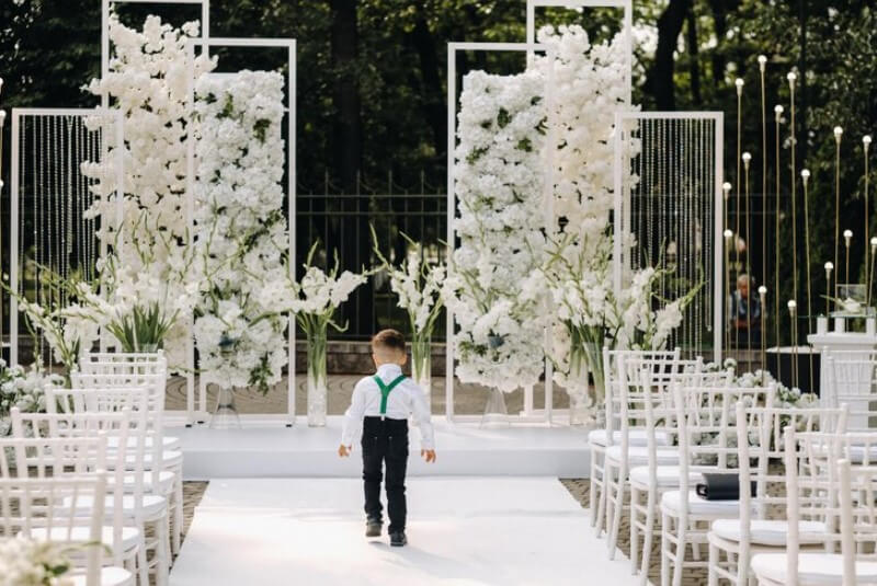 set of wedding ceremony and boy walking