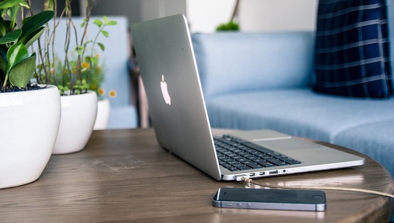 macbook and moblie on table
