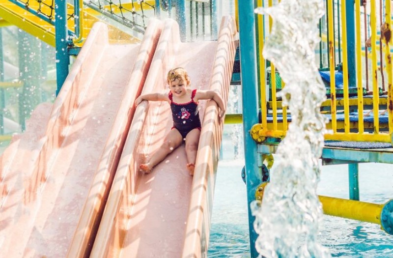 child enjoy slide