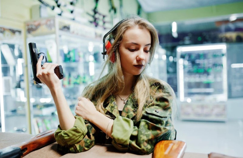 girl with pistol