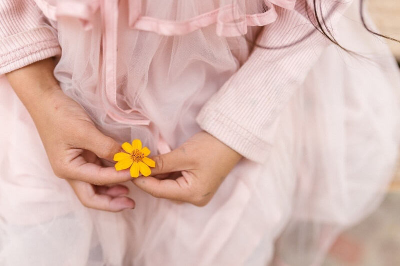 woman pick a flower