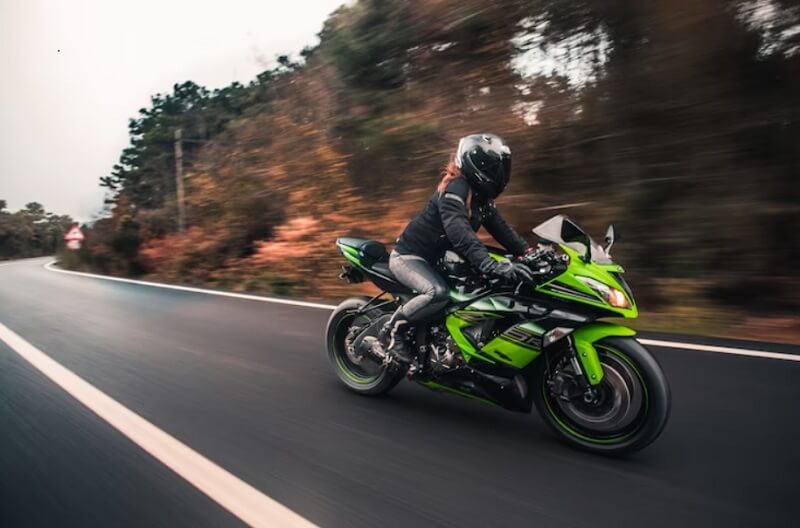 woman driving on the bike